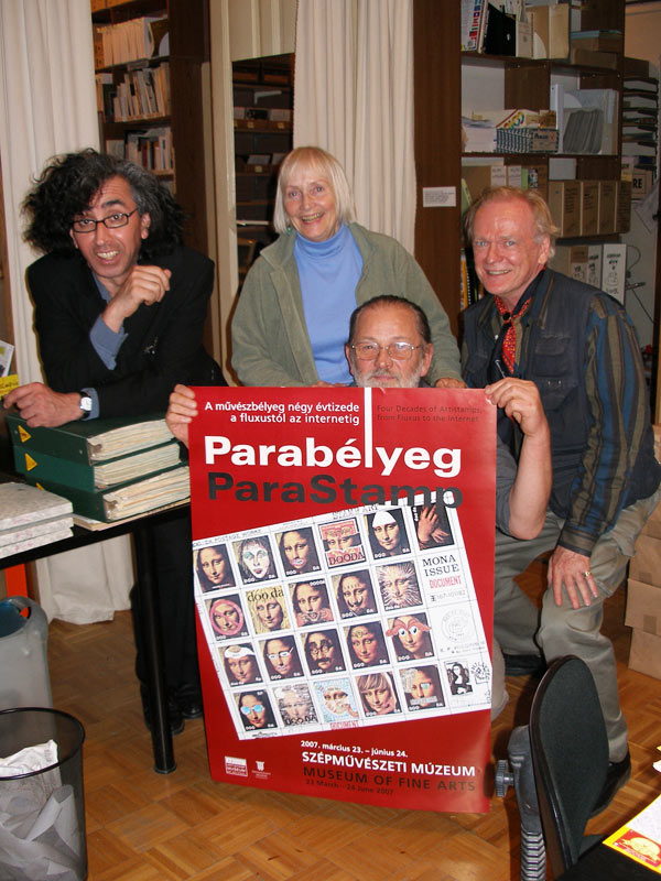 Michael Hernandez de Luna, Patricia Tavenner, György Galántai, Jas W. Felter in Artpool behind the poster of the ParaStamp exhibition in 2007.